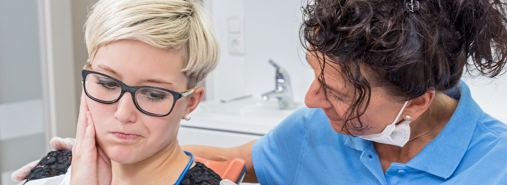 A split image of a woman receiving a dental cleaning from a professional, with the left side showing the patient and the right side showing the dentist at work.